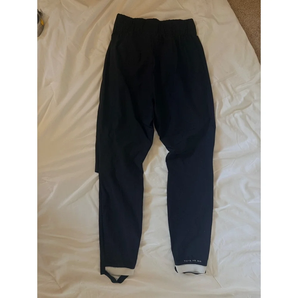 Nike Sportswear Tech Pack Stirrup Pants Black Tapered Knee Vent Women's Medium